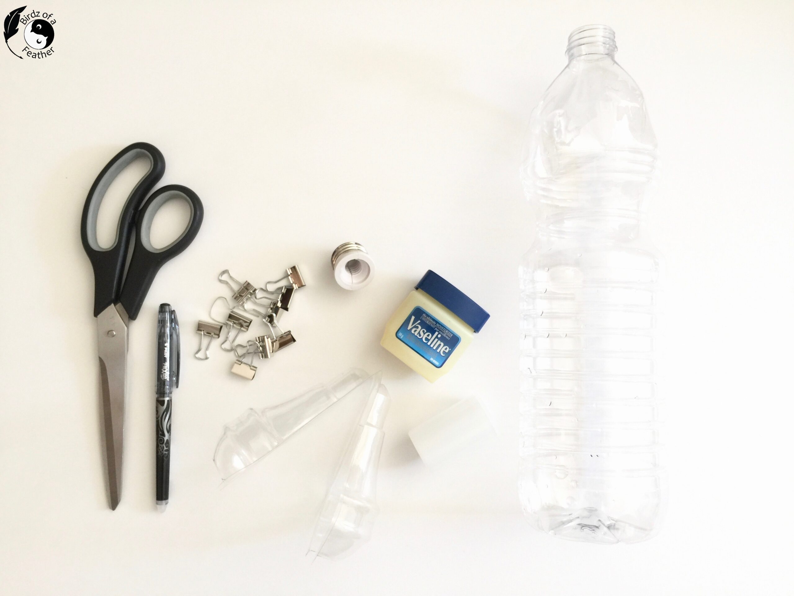 Materials for cement planter molds include LED plastic packaging, a standard base adapter, scissors, marker, binder clips, plastic bottle and vaseline to release the mold