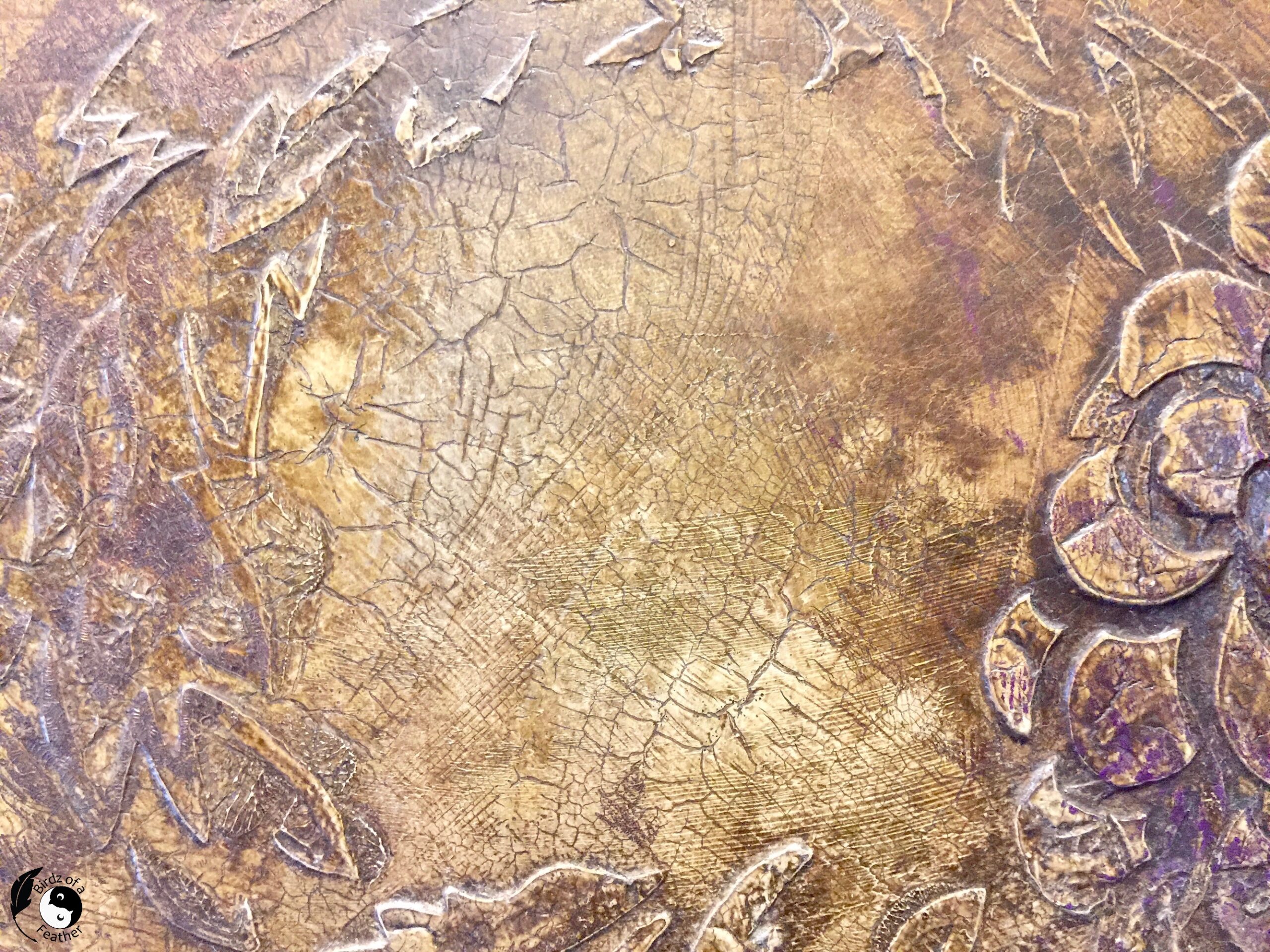 Decoupage on wood is emphasized with crackle faux finish, stain and wax