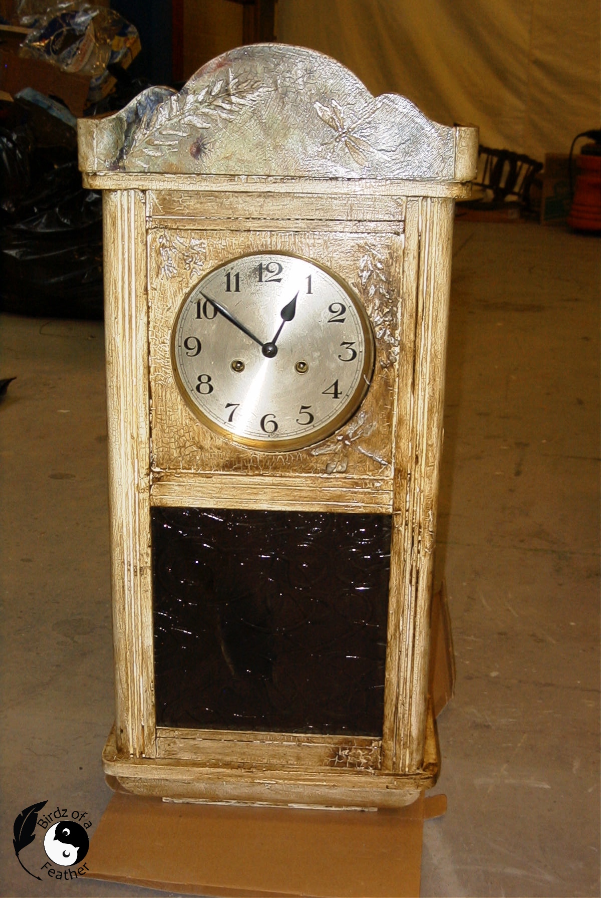 Clock showing finished decoupage on wood project.