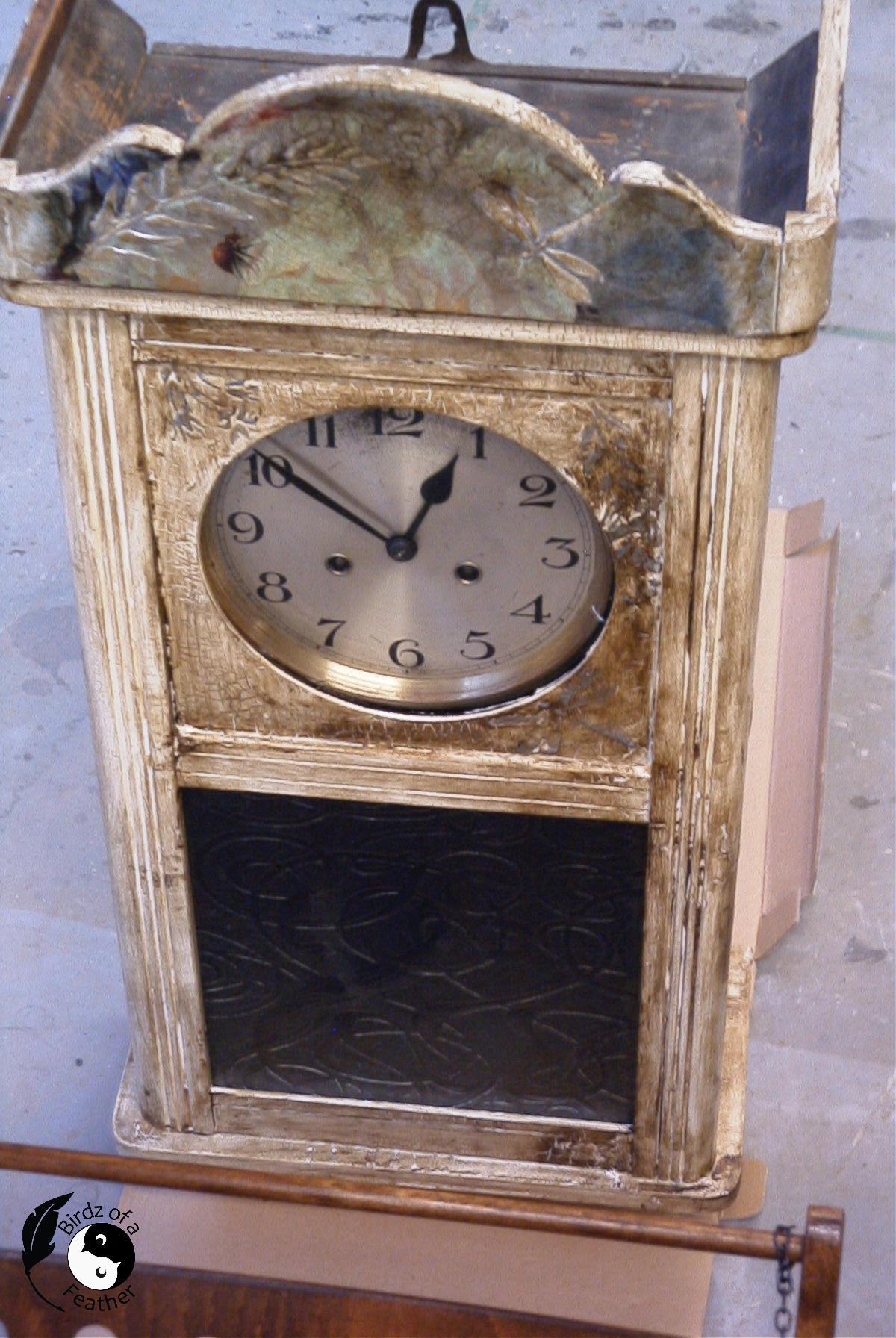 Clock showing finished decoupage on wood project.