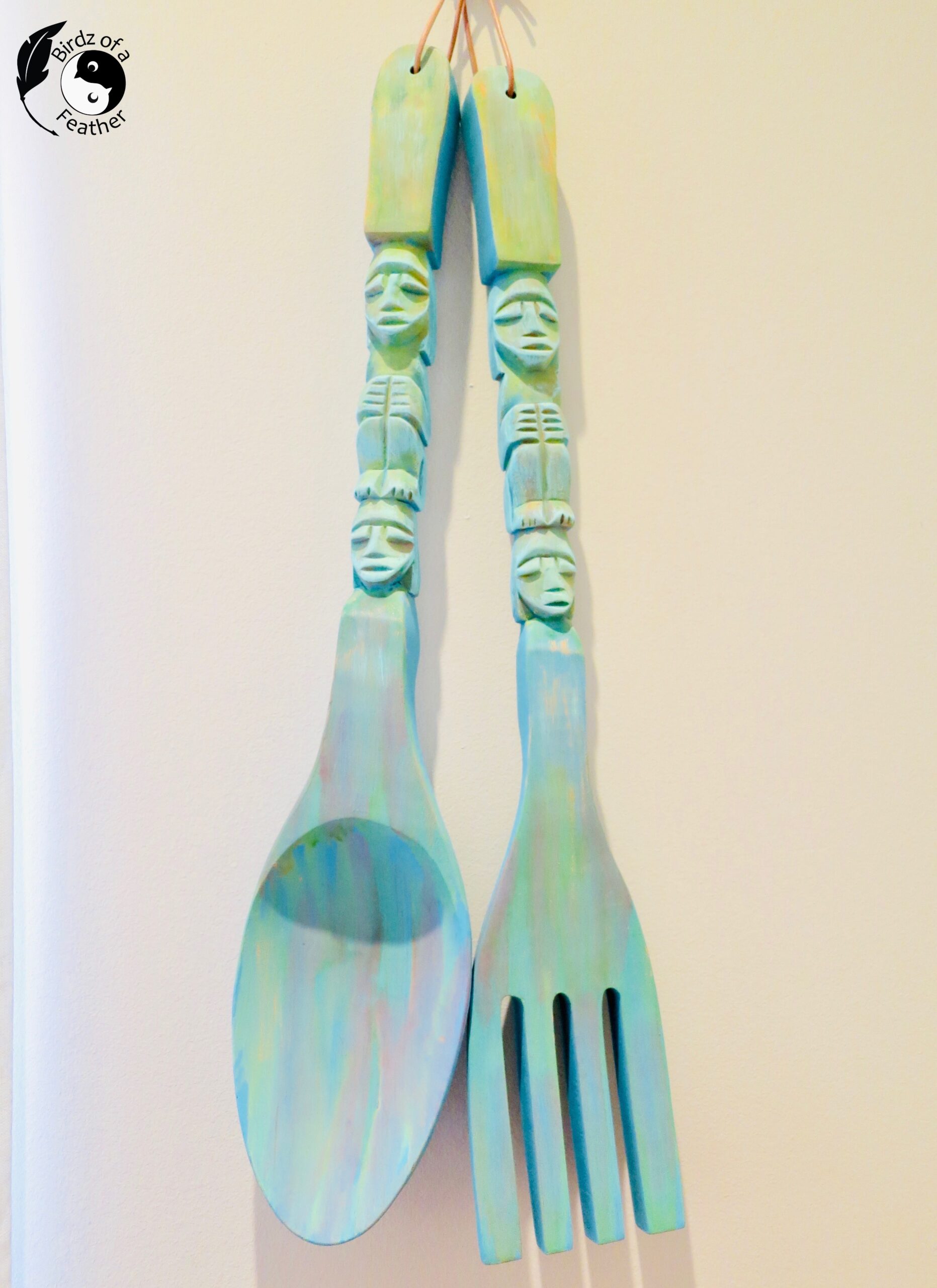 rubber mallet on top of cans of Terra Clay Paint