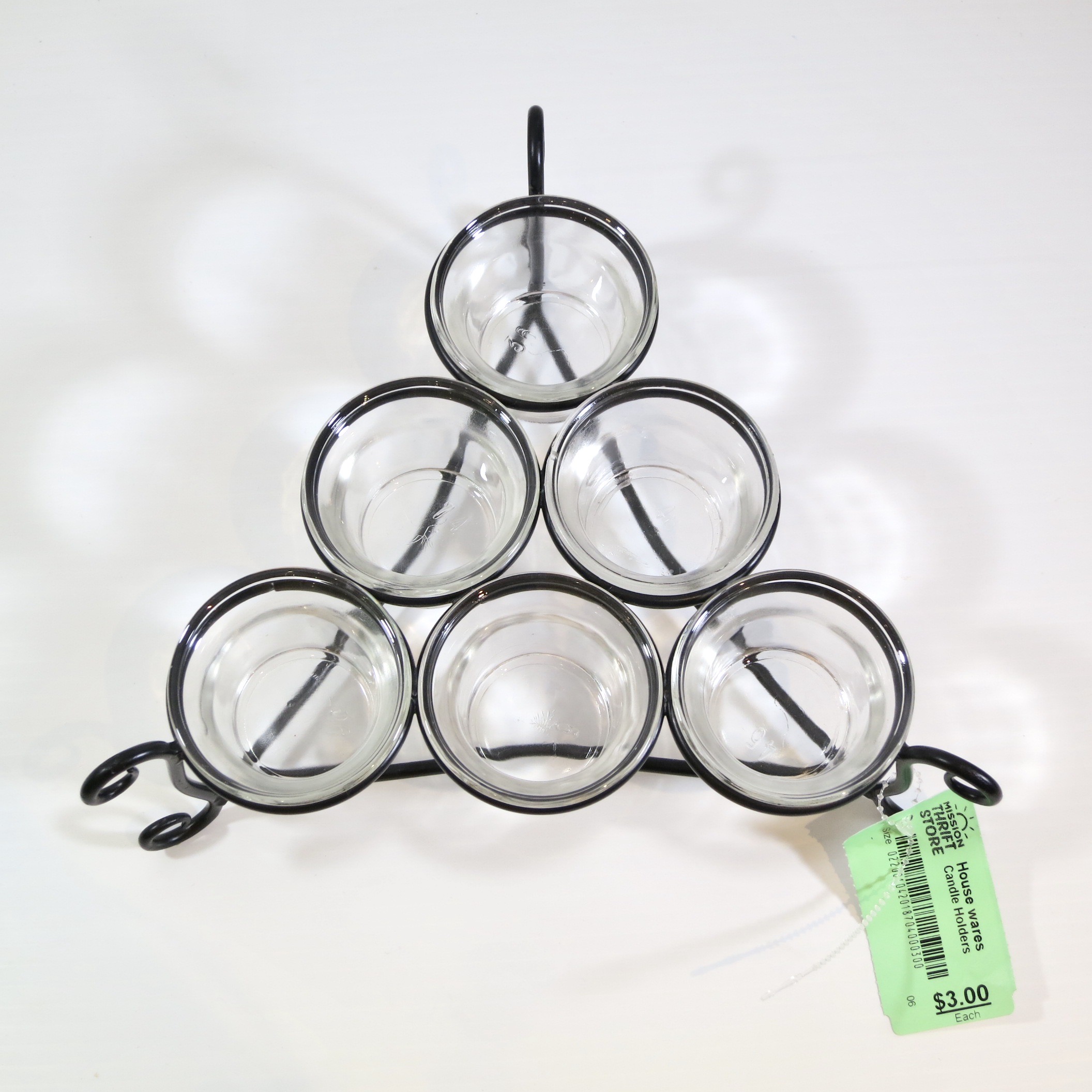 Candle holder being used for christmas plant decor