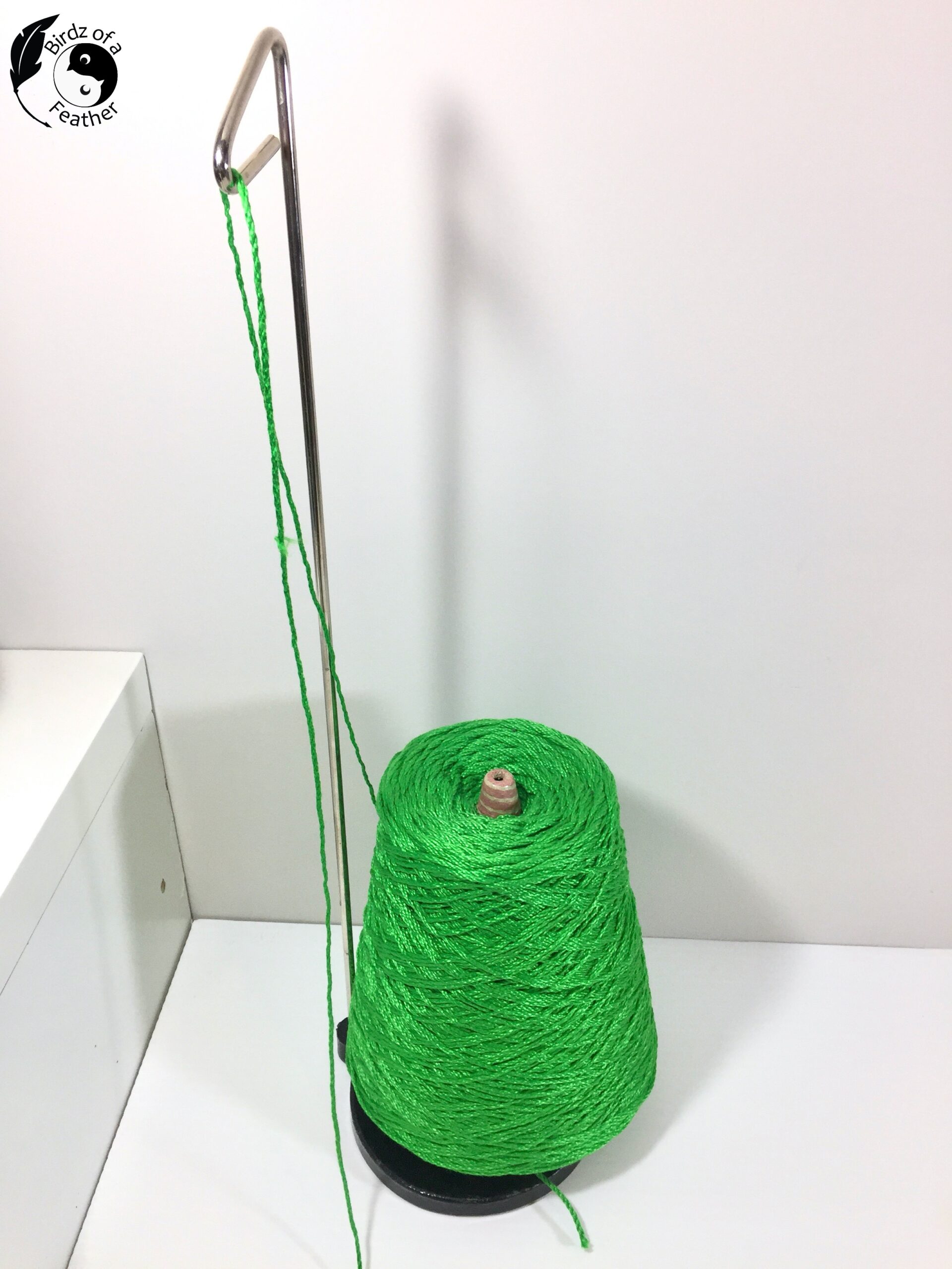 Spool of green yarn