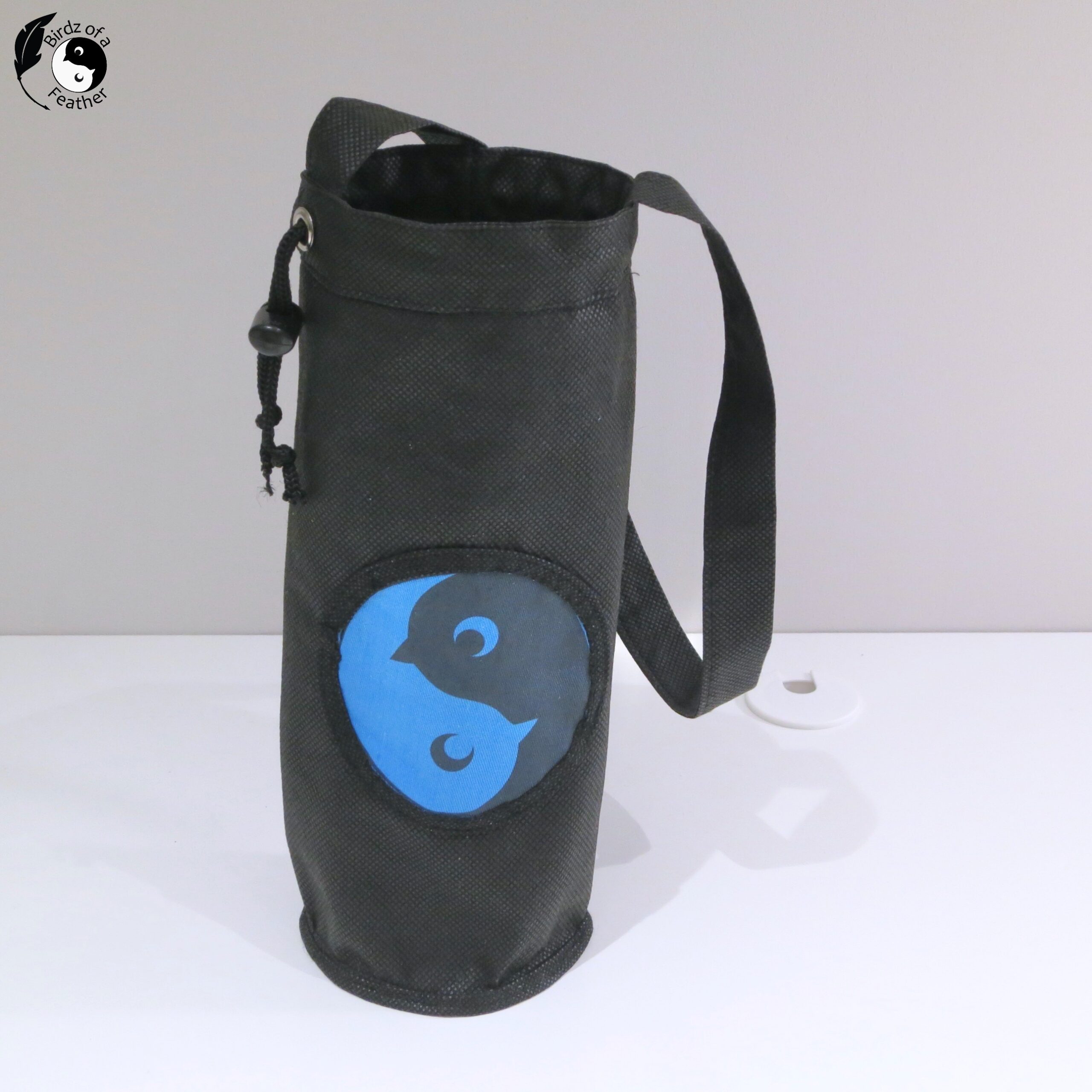 Empty water bottle holder bag on table