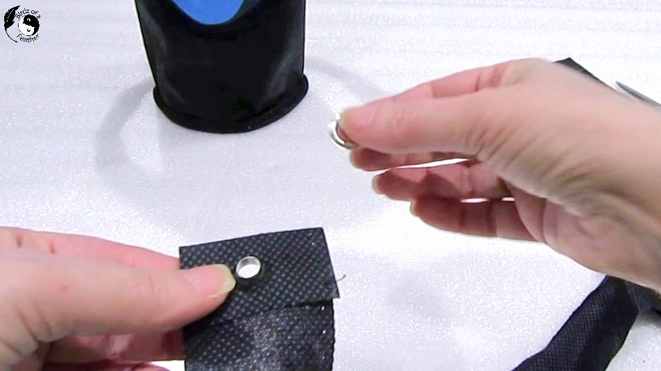 Inserting grommet into hole