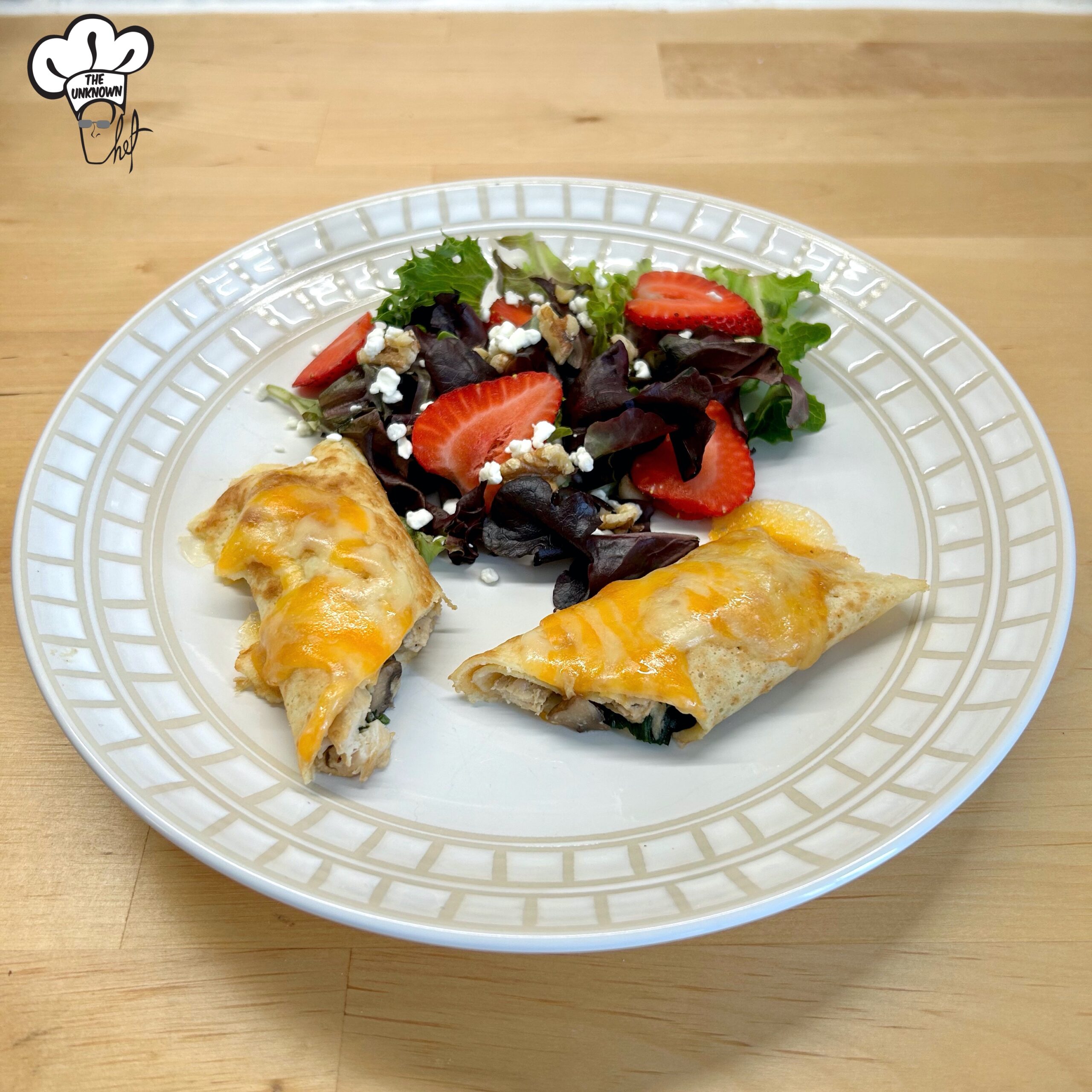 Chicken crepes on plate with salad using shredded chicken recipe