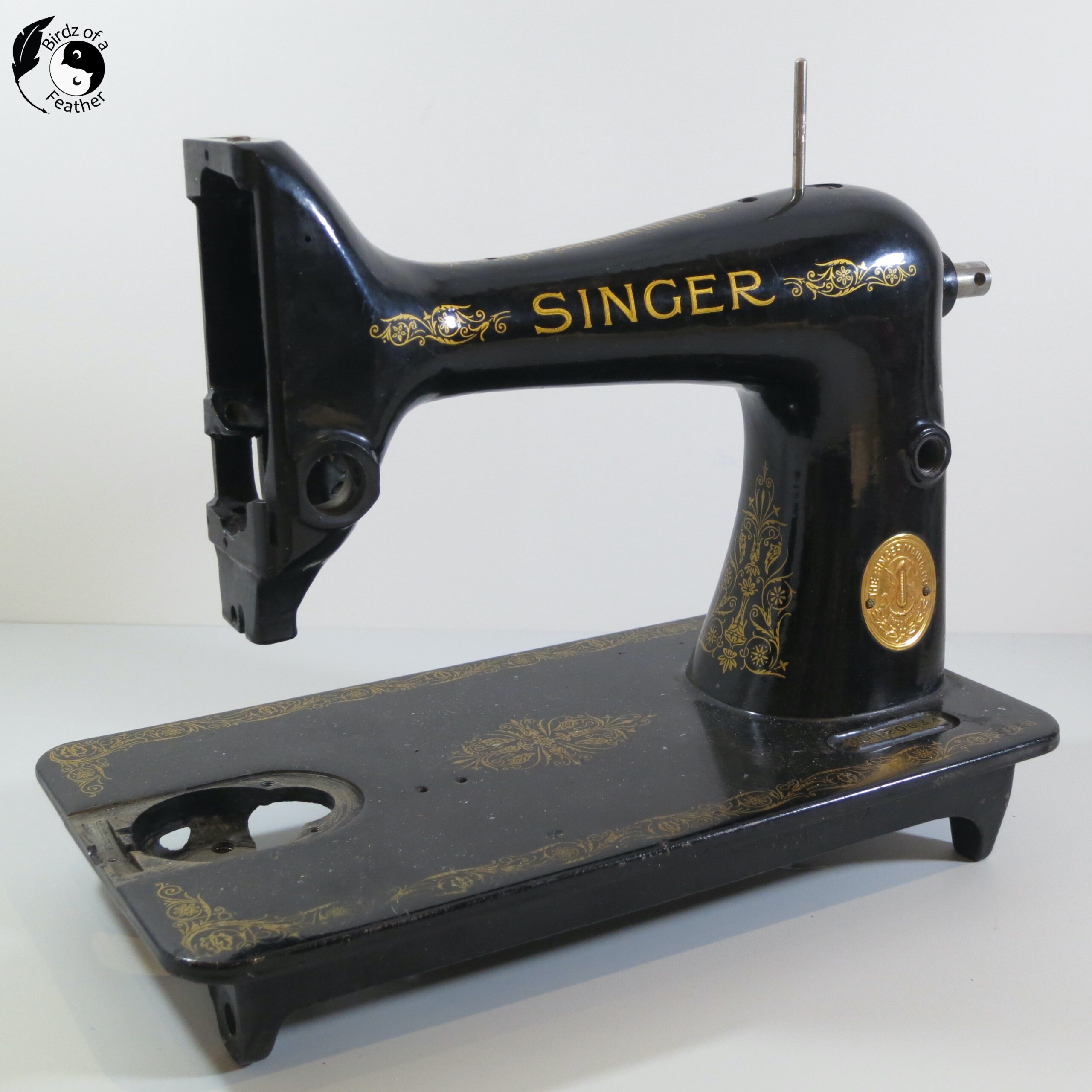 Singer sewing machine stripped of its parts