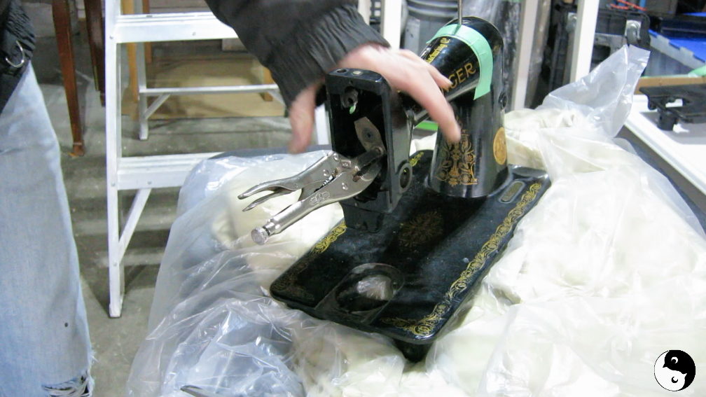 Vice grips on the end of the sewing machine