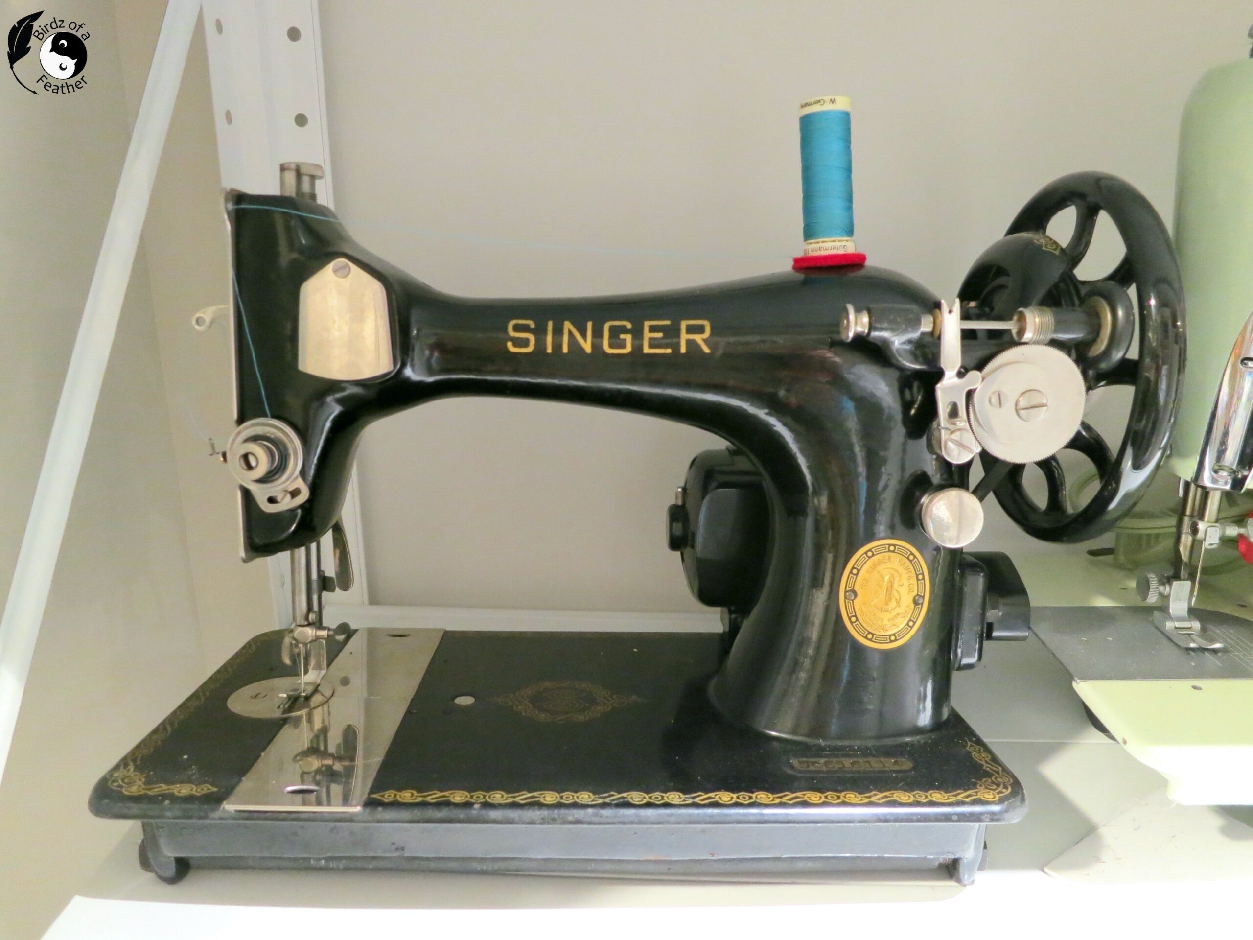 Model 99 Singer sewing machine on shelf
