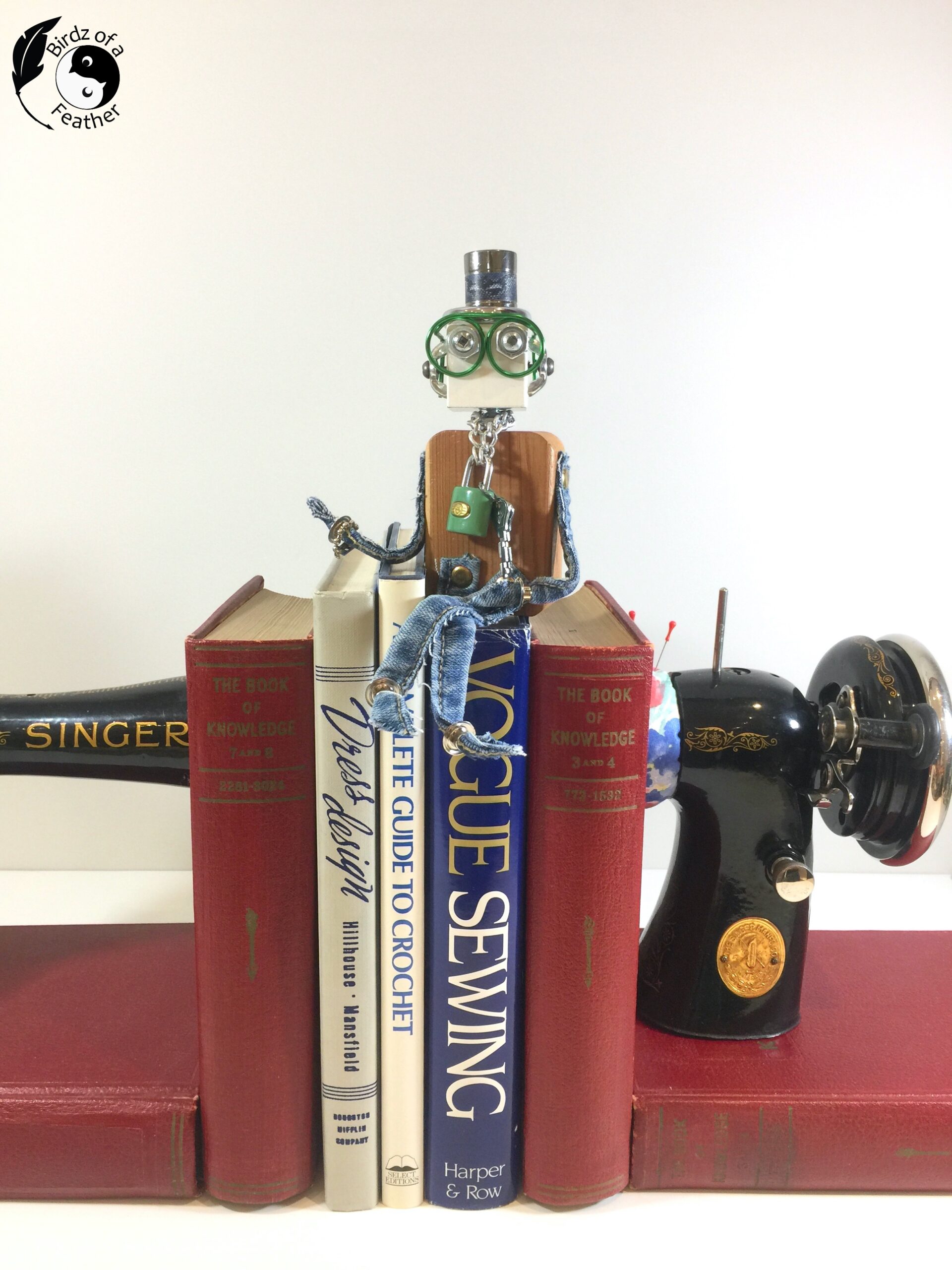 Scrap robot on top of bookends