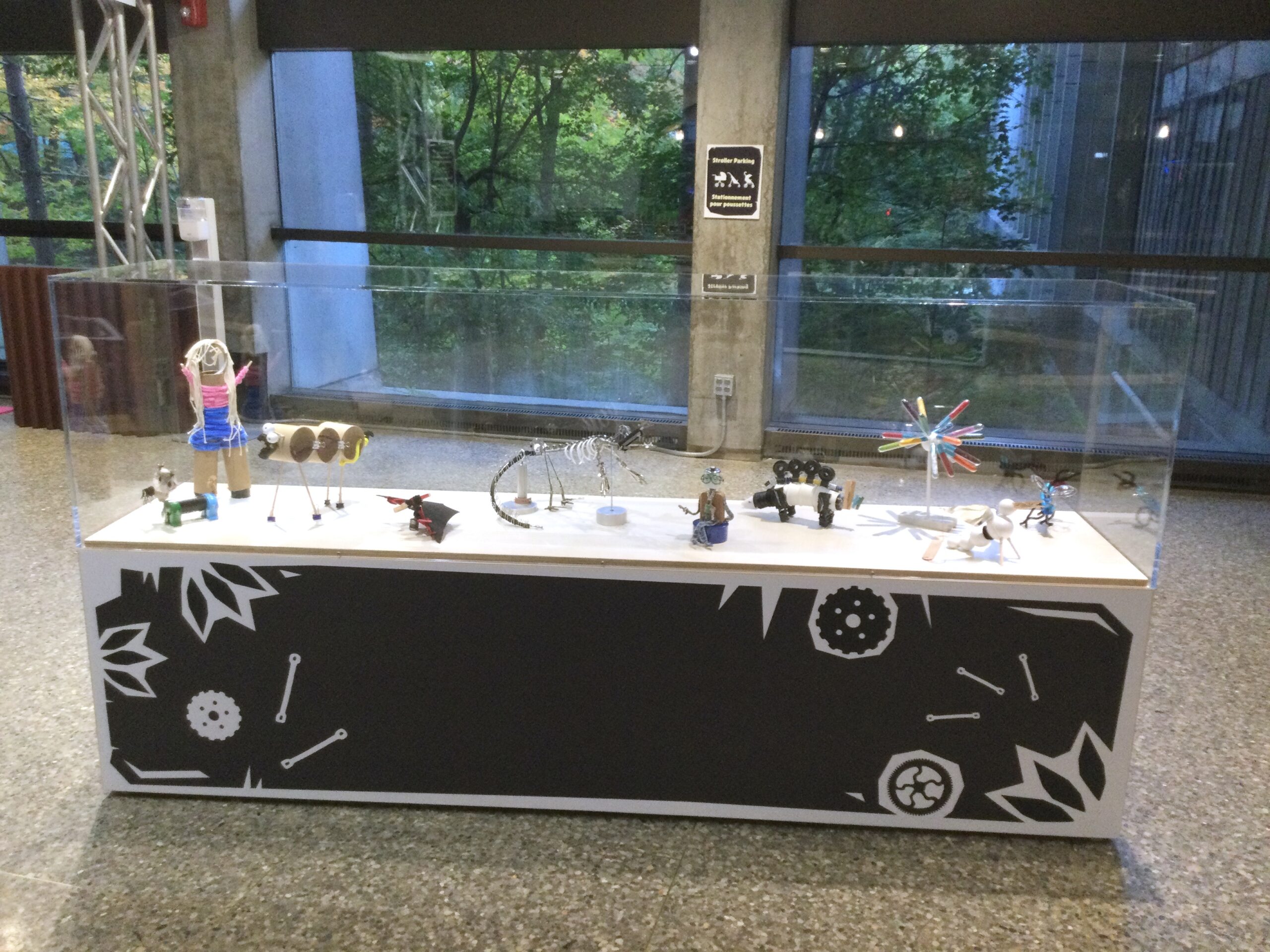 Display case with scrap robots at the Ontario Science Centre