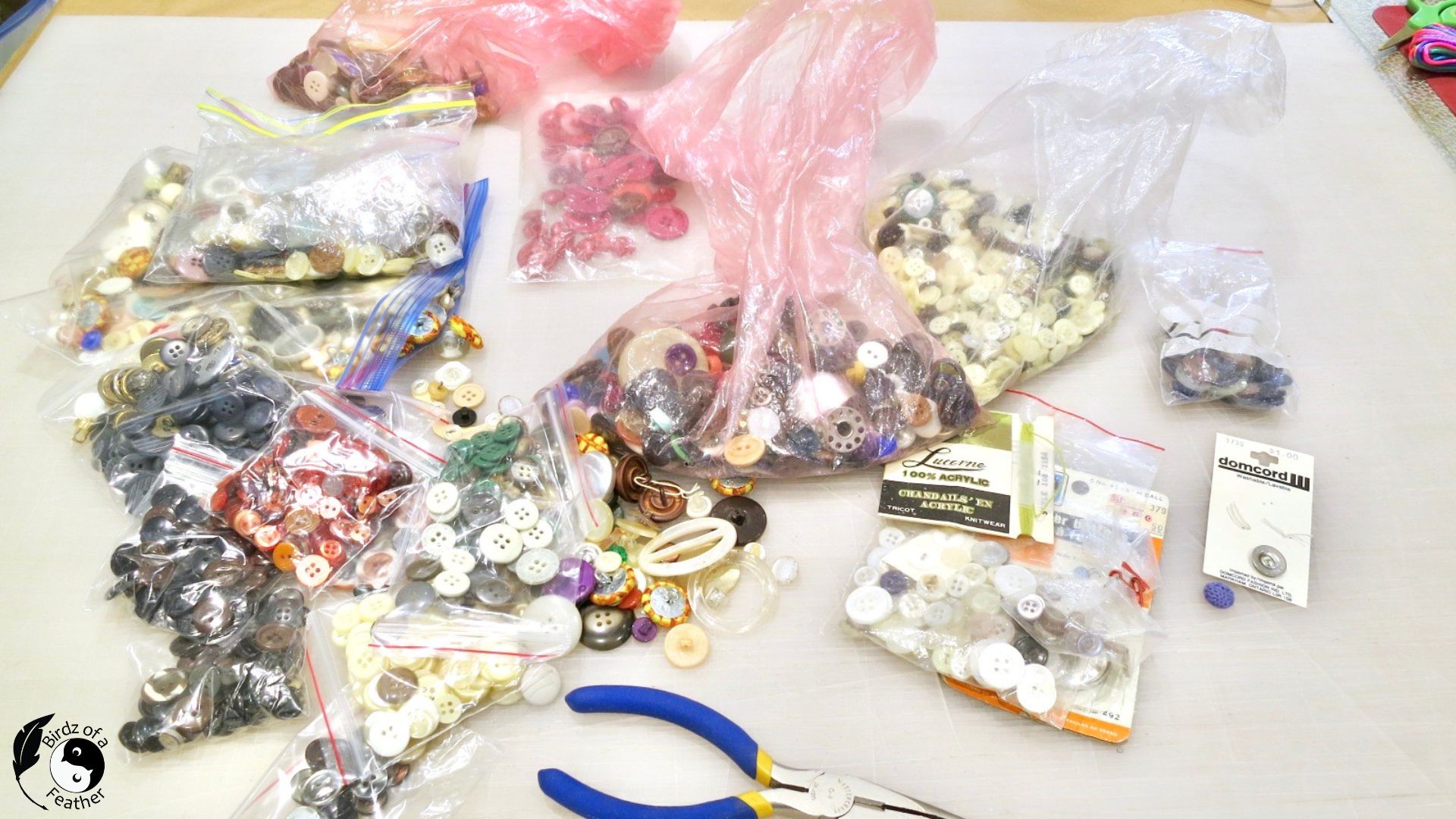 bags of buttons for the sun catcher