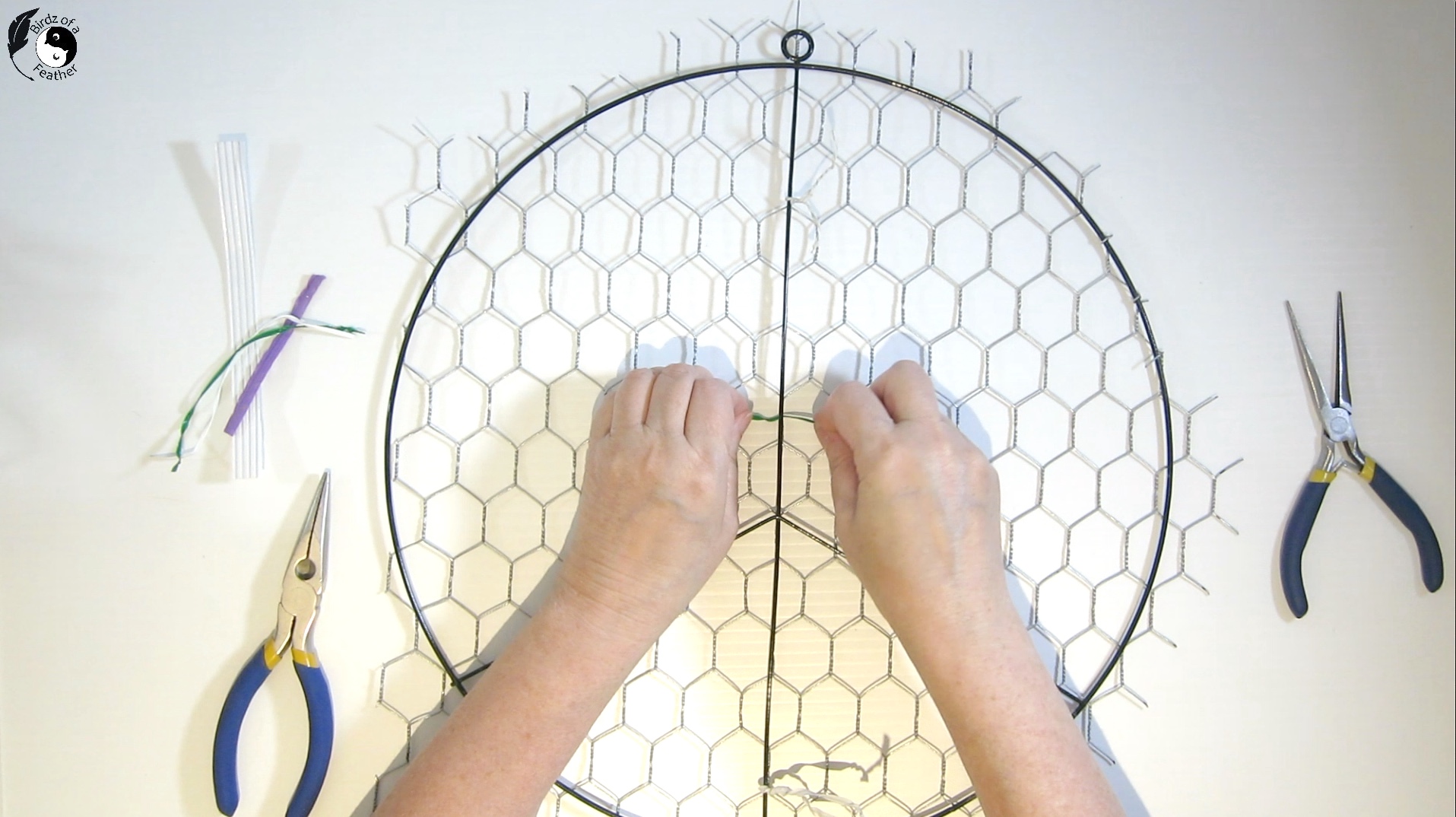 Wrapping twist ties around the centre of the suncatcher diy