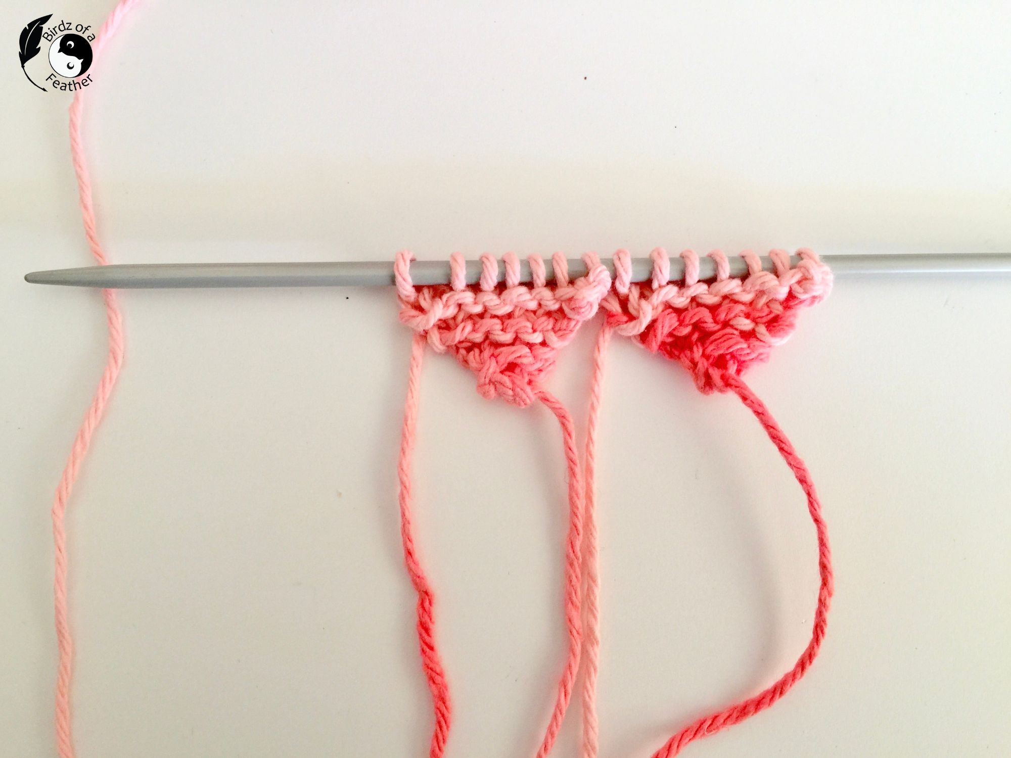 2 pieces of knit heart on knitting needle