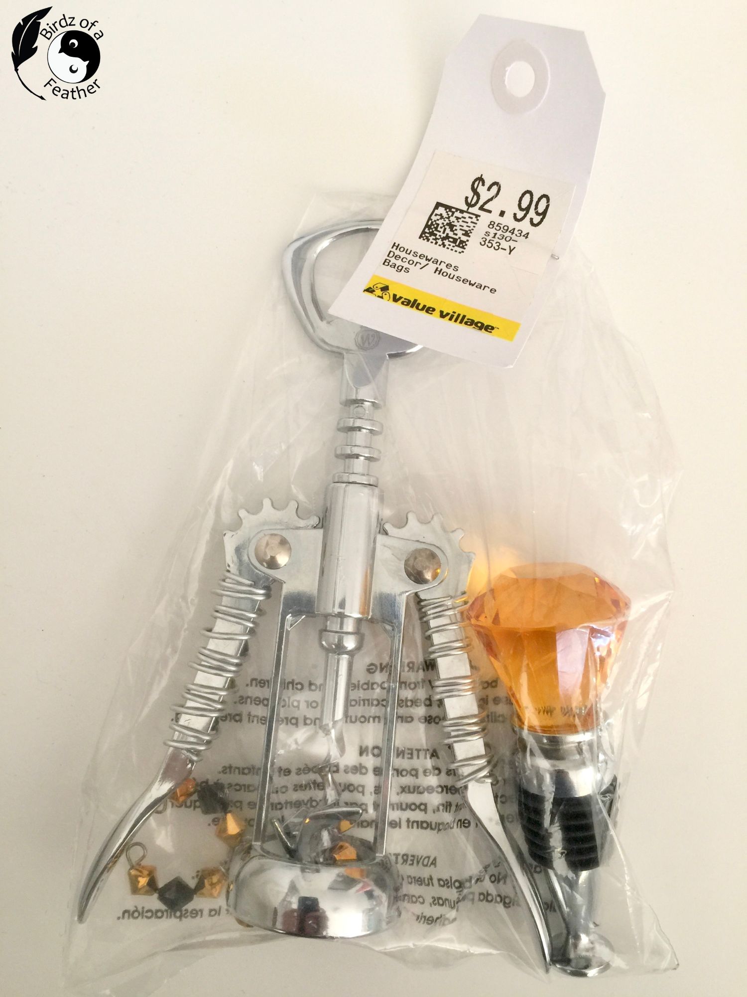 Thrift store bottle opener set in a bag marked $2.99