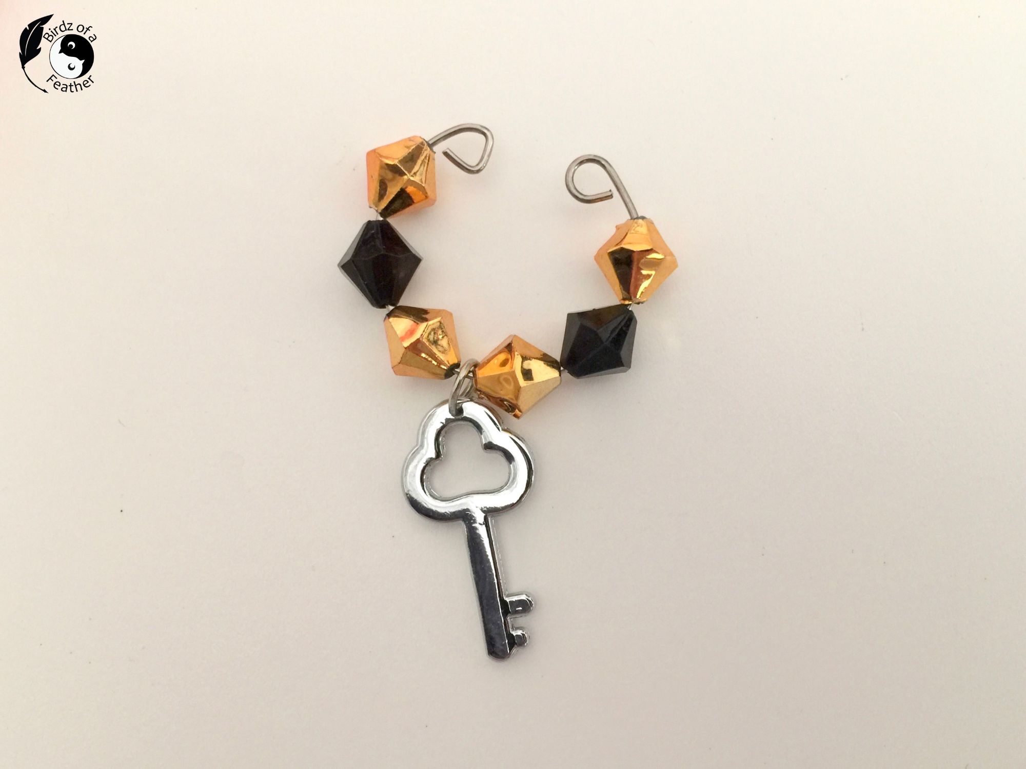 Wine charm with gold and black beads and key for DIY Charm Necklace
