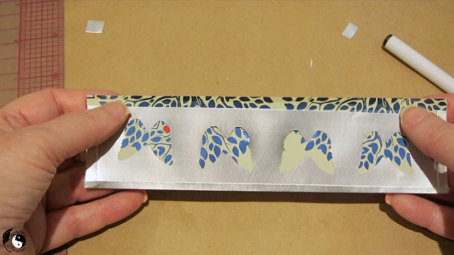 Showing three sides that are complete with one side to go for the DIY soda can bracelet