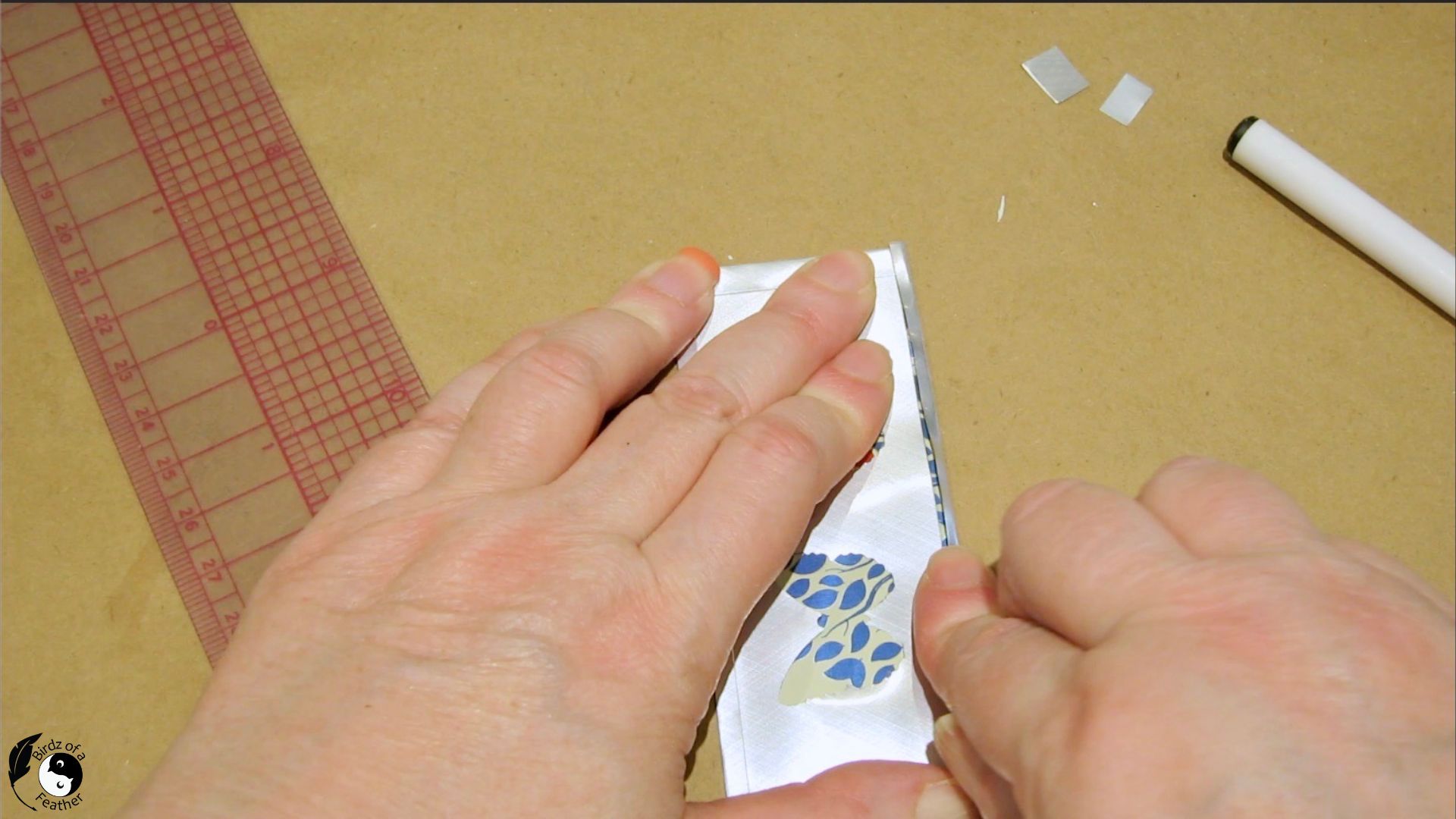 Making the first fold on the last long edge