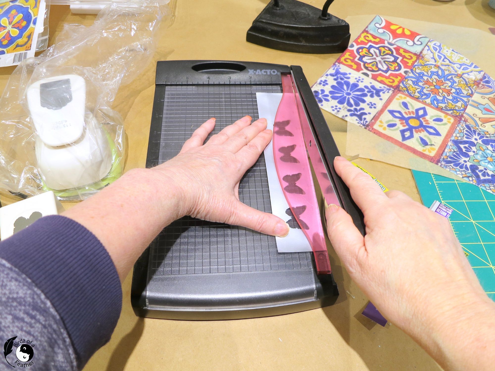 Trimming the width of the strip of aluminum can for the DIY soda can bracelet