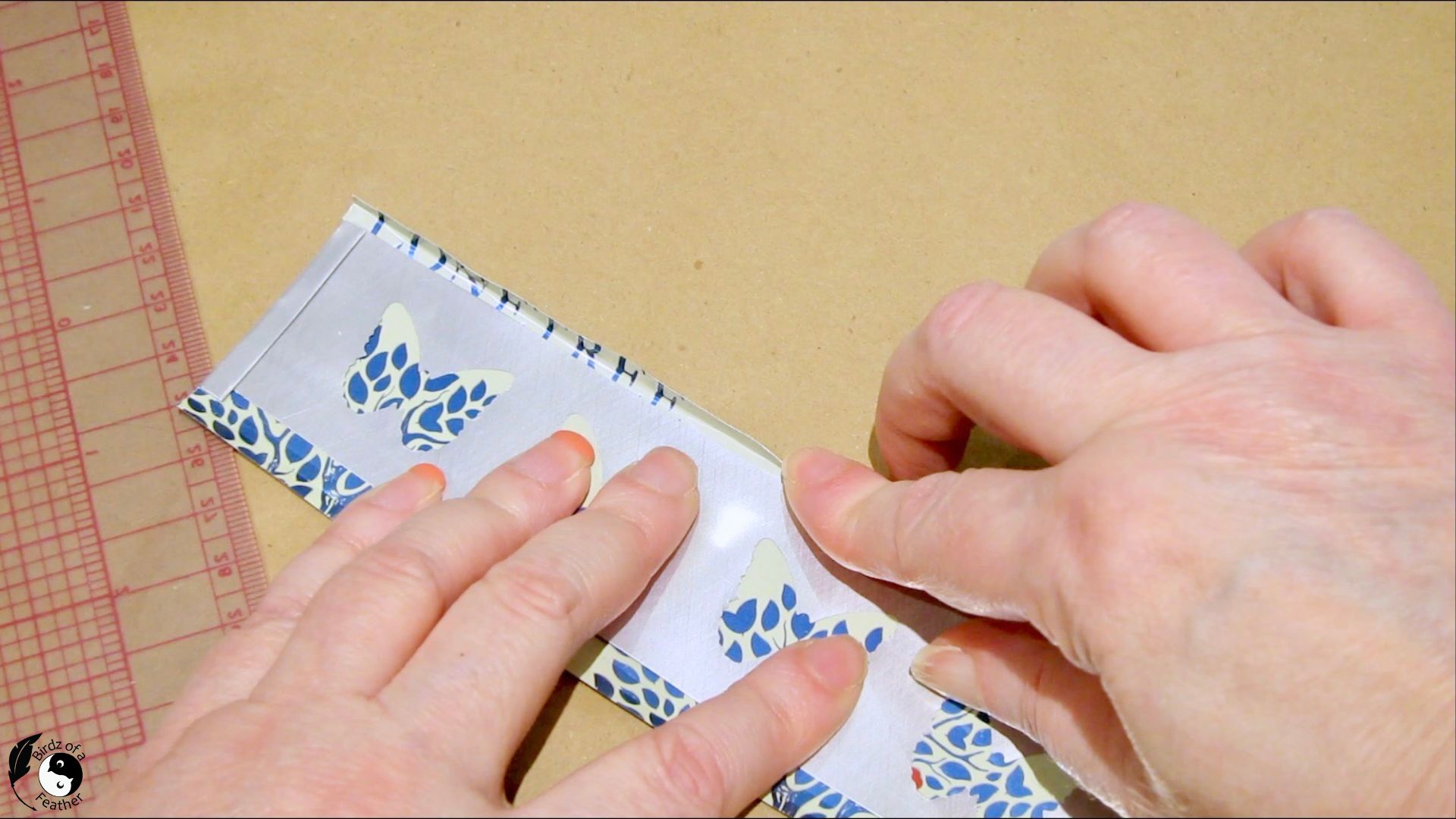 Folding in the long edges of the can