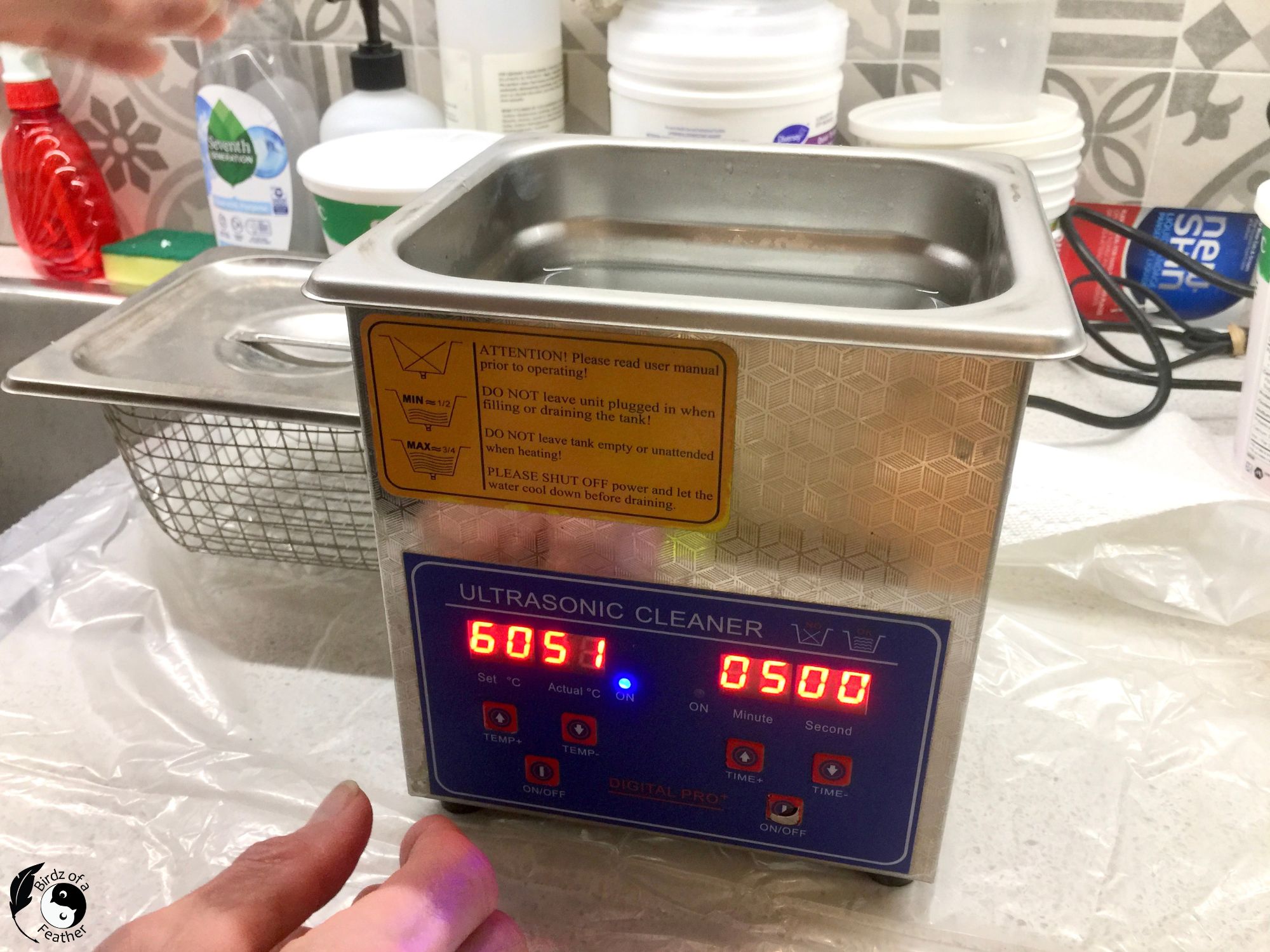 Ultrasonic cleaner set to 5 minutes